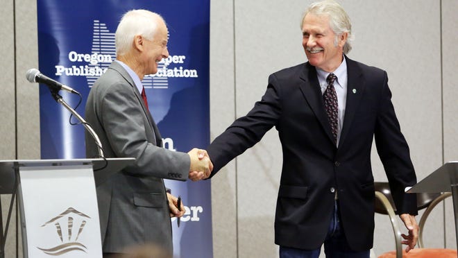 Neither Rep. Dennis Richardson, left, nor Gov. John Kitzhaber has received money from public employee unions in 2014.
  SJ file Rep. Dennis Richardson, R-Central Point, left, and Democratic Gov. John Kitzhaber shake hands after meeting on July 18 in their first debate during the annual Oregon Newspaper Publishers Association convention.
 KOBBI R. BLAIR / Statesman Journal file Rep. Dennis Richardson left, and Democratic Gov. John Kitzhaber shake hands after their first debate Friday. 
 KOBBI R. BLAIR / Statesman Journal Rep. Dennis Richardson, R-Central Point, left, and Democratic Gov. John Kitzhaber shake hands after meeting on Friday, July 18, 2014 in their first debate of the campaign season during the annual Oregon Newspaper Publishers Association convention, where they were quizzed by a panel of five newspaper editors, publishers and reporters.