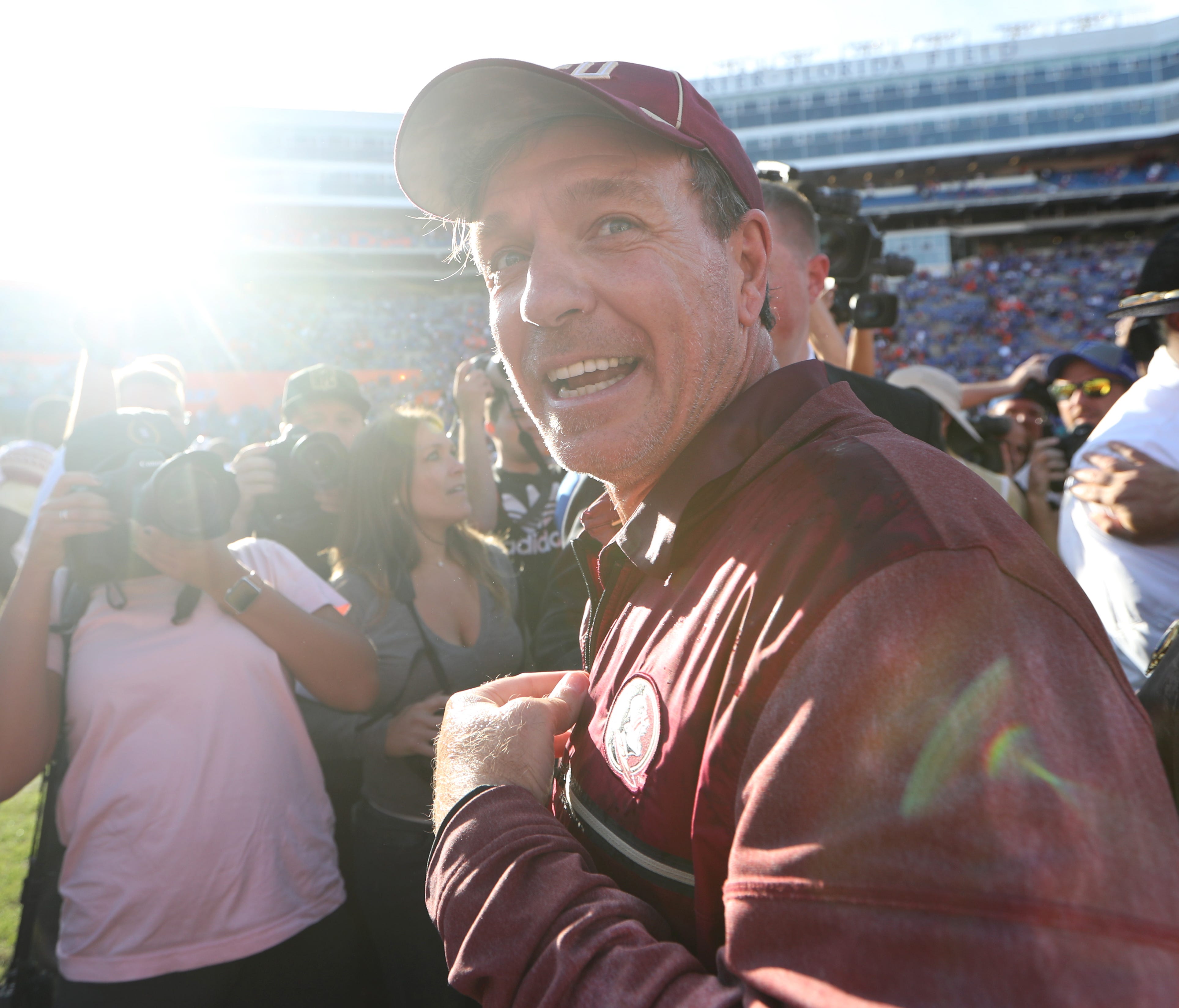 FSU Head Coach Jimbo Fisher smiles after the Seminoles 38-22 win over Florida at Ben Hill Griffin Stadium in Gainesville on Saturday.   