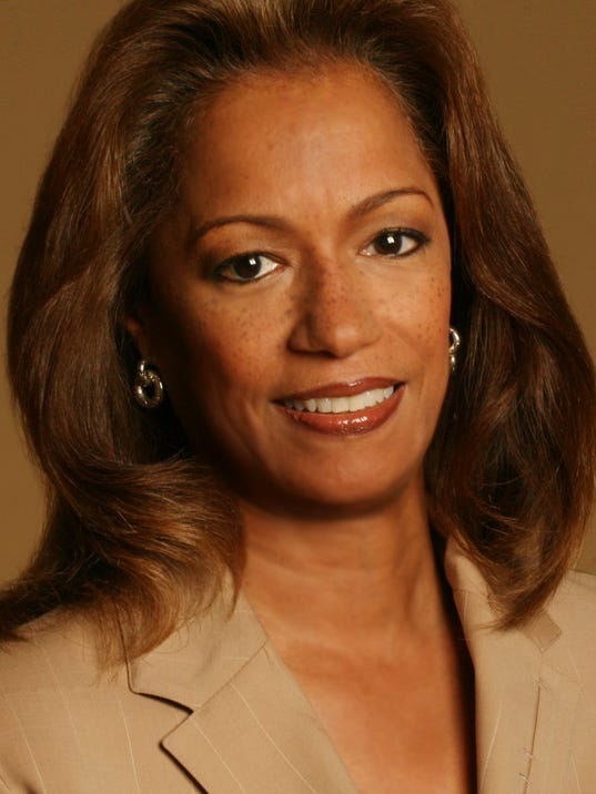 Longtime television anchor Carmen Harlan is voice of QLINE Detroit cast members being interviewed, at the 2017 essence fest center stage.