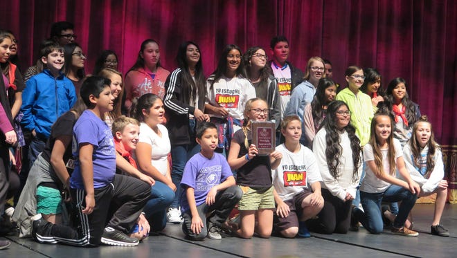 Students from Lava Ridge Intermediate School pose with their awards during the Dixie State University Spanish Language Fair on Friday.