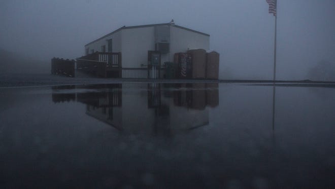 The Waynesboro Tourist Information Center is shrouded in fog atop Afton Mountain on Tuesday evening.