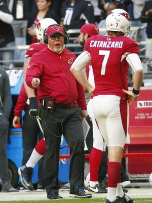 Arizona Cardinals head coach Bruce Arians yells at kicker Chandler Catanzaro (7) after he missed an extra point against the New Orleans Saints during the second quarter at University of Phoenix Stadium in Glendale, Ariz. December 18, 2016.