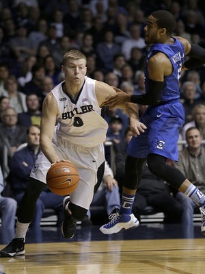 Butler Bulldogs forward Austin Etherington (0) drives around Creighton Bluejays guard Khyri Thomas (2) in the first half of the Big East Conference basketball game Tuesday, Feb 16, 2016, evening at Hinkle Fieldhouse.