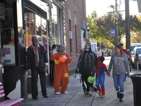 Trick or treaters on Oct. 31, 2017.