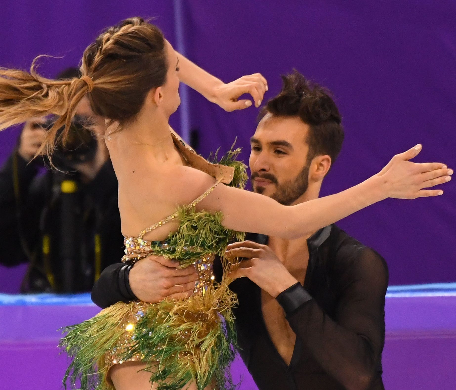 French ice dancer Gabriella Papadakis' dress became unfastened during her performance and she fought the rest of the way. Her partner is  Guillaume Cizeron.