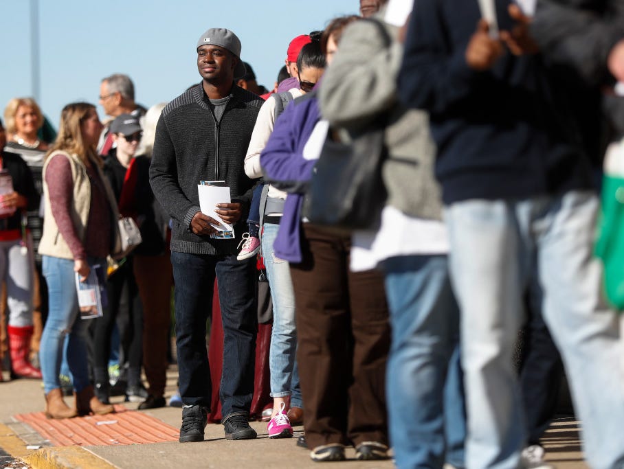 A line of early voters waits outside the Franklin County Board of Elections Monday in Columbus, Ohio. Heavy turnout caused long lines as voters took advantage of their last opportunity to vote before Election Day.