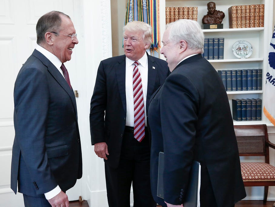 This file handout photo taken on May 10, 2017 made available by the Russian Foreign Ministry shows shows President Trump speaking with Russian Foreign Minister Sergey Lavrov and Russian ambassador Sergey Kislyak during a meeting at the White House.