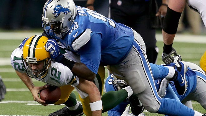 Lions defensive tackle Nick Fairley takes down Packers QB Aaron Rodgers during the Lions' win Sunday at Ford Field.
