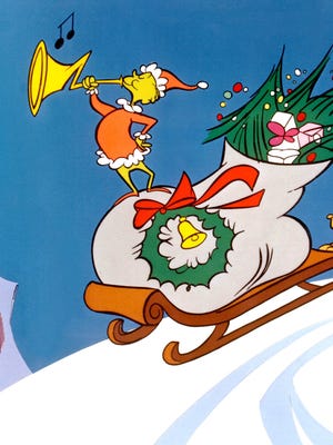 The Grinch finds the strength of 10 Grinches, plus 2, in "Dr. Seuss' How the Grinch Stole Christmas."