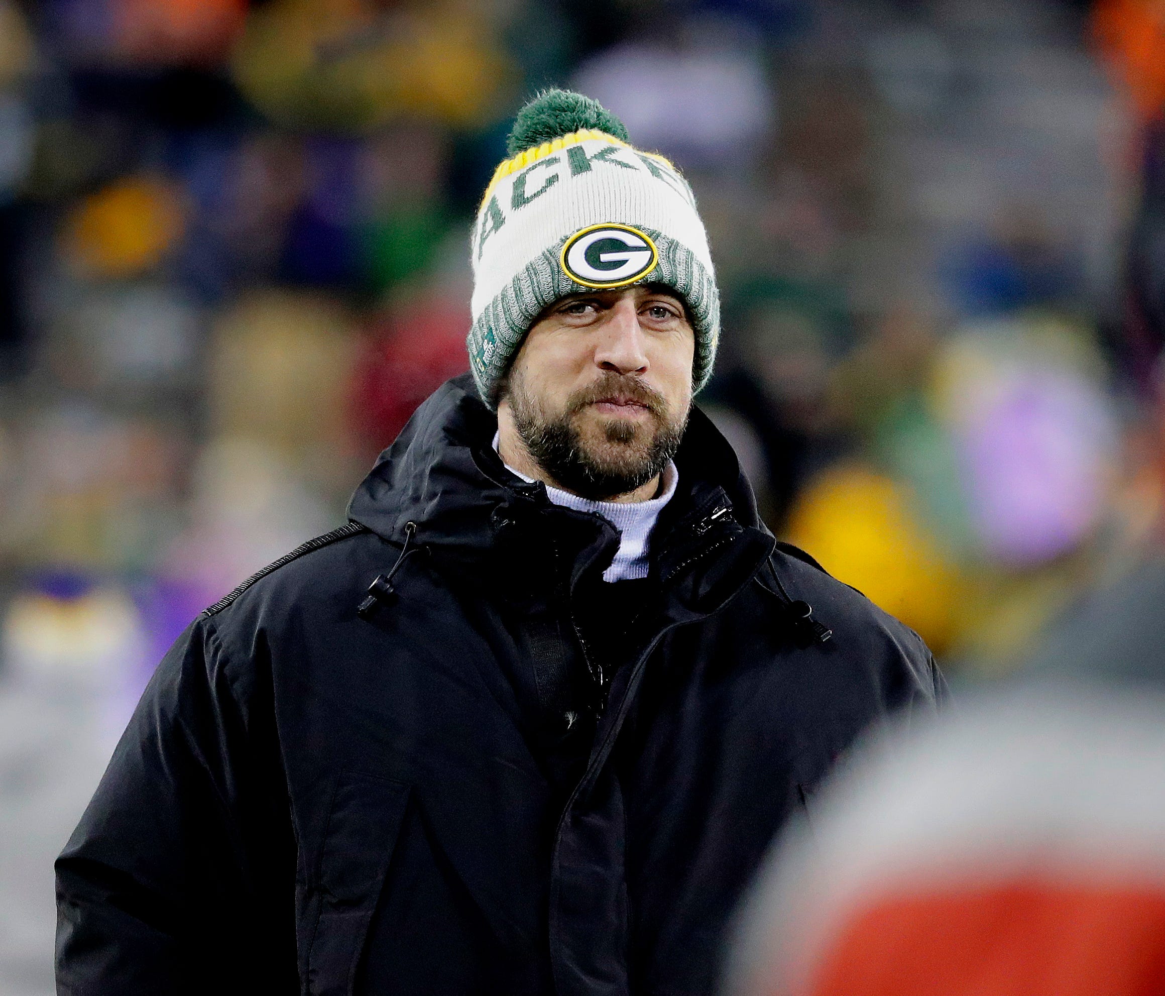 Green Bay Packers quarterback Aaron Rodgers watches from the sideline before the game against Minnesota.