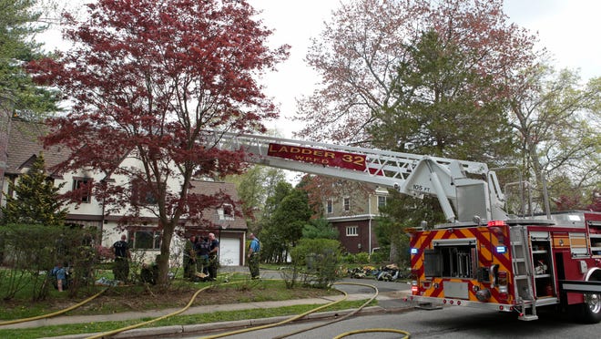 Firefighters from White Plains battled a fire in a home at 50 Midchester Avenue on Tuesday.