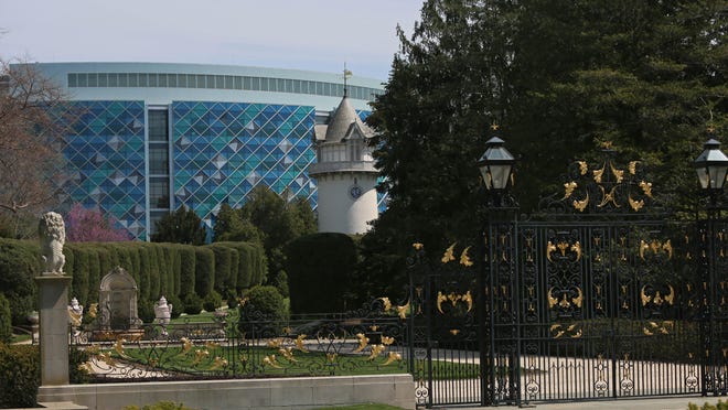 The expansion of the Nemours/Alfred I. duPont Hospital for Children dominates the background of landscape at Nemours Estate gardens.