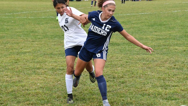 Any contact like this between Somerset Berkley's Abby Shea (12) and Seekonk's Emily Chin is sure to earn a whistle this fall.