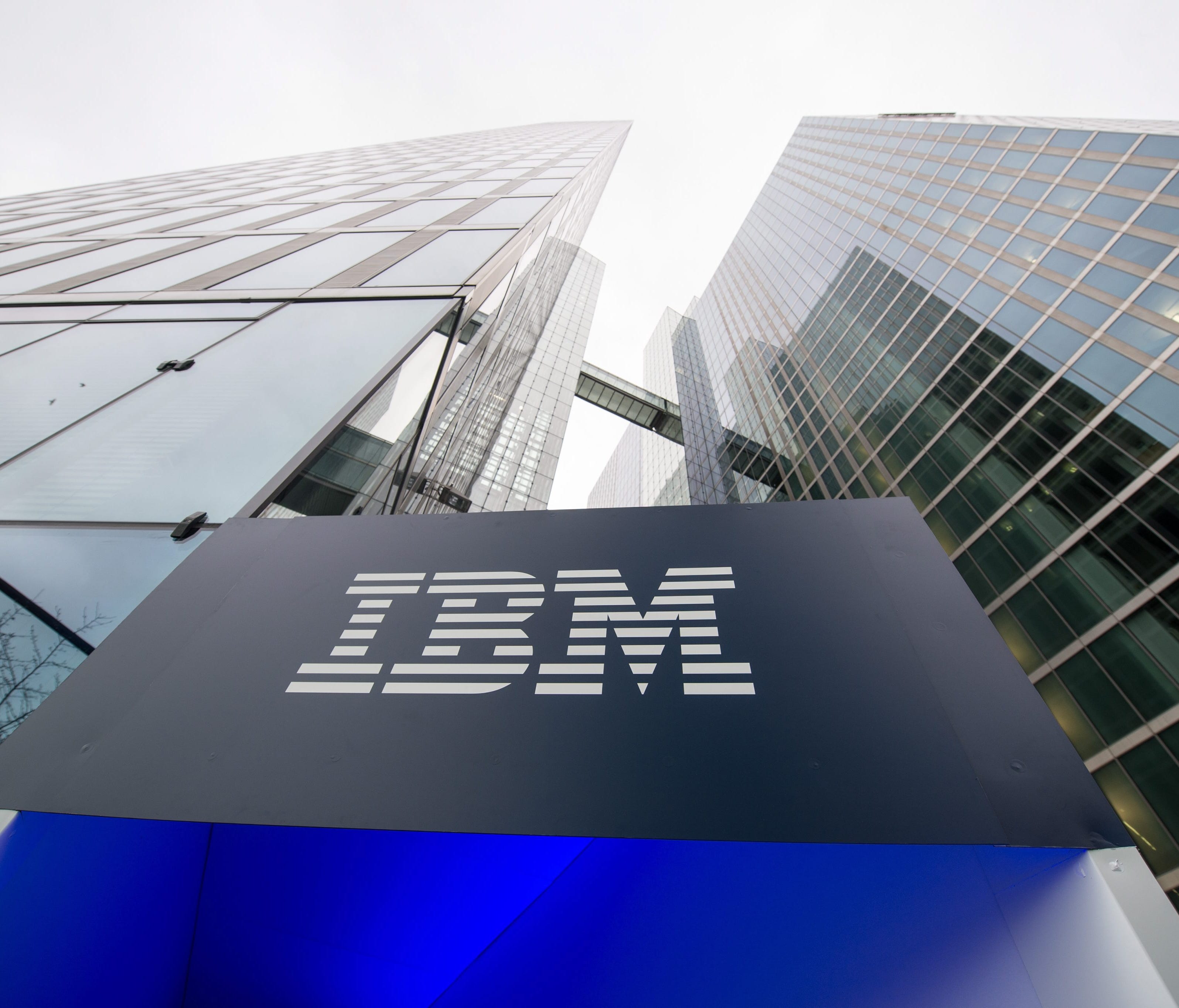 A file photo dated 15 December 2015 showing the logo of IBM seen at the entrance to the Highlight Towers in Munich, Germany. Technology corporation IBM is to release their 4th quarter results on 19 January 2016.