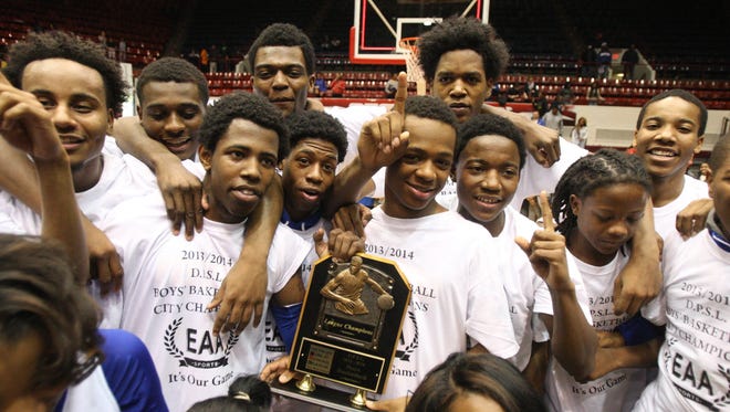 Detroit Pershing celebrates their 57-56 overtime win against Southeastern in the Boys PSL Championship game on February 21, 2014 at Calihan Hall in Detroit.