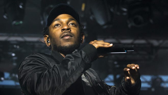 Kendrick Lamar performs during the Cleveland Cavaliers & Turner Sports Home Opener Fan Fest on October 30, 2014 in Cleveland, Ohio.