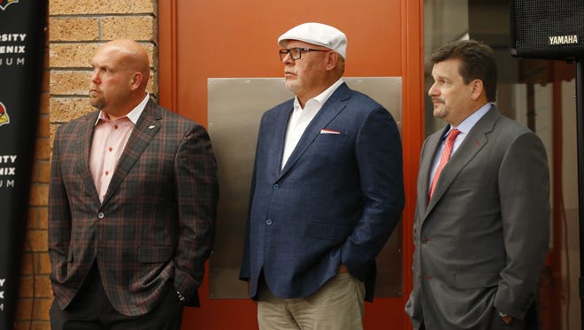 Arizona Cardinals GM Steve Keim, head coach Bruce Arians and owner Michael Bidwill listen to their first-round draft pick, Robert Nkemdiche, a defensive tackle from Ole Miss at the Cardinals Training Facility in Tempe, Ariz., on Friday, April 29, 2016.