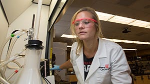 Amberlie Clutterbuck, a doctoral candidate in chemistry at the University of Cincinnati, simulates a smoking session with steam stones to learn what toxic metals are contained in the vapor.