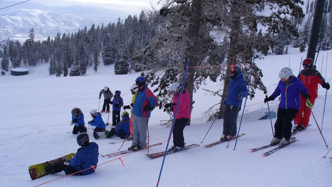 In this file photo, seniors prepare to participate in downhill ski racing and snow boarding at Mt. Rose for the Reno-Tahoe Winter Senior Games.