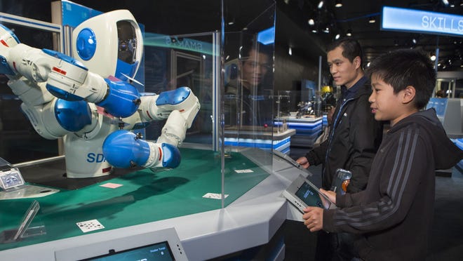 The Robotic21 System from Yaskawa Motoman Robotics of Japan allows guests to play a game of 21.