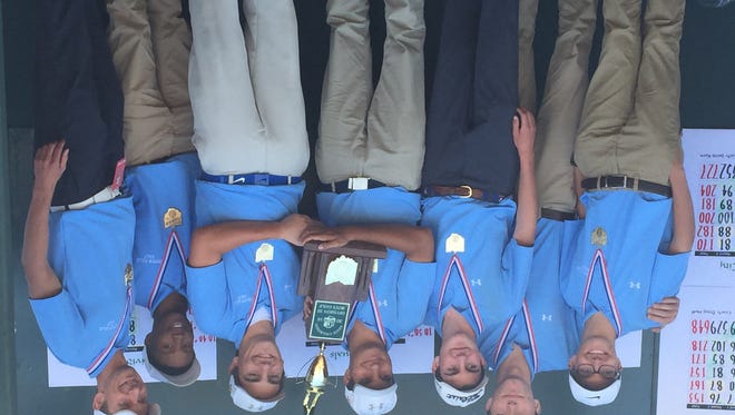 Seven Hills golf team posses with the Division III state championship trophy, Saturday, October 15 at NorthStar Golf Club in Sunbury.