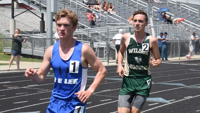 Wilson Memorial’s Vincent Leo, right, and Robert E. Lee’s Oliver Wilson-Cook compete in the boys 3,200-meter run at the VHSL Class 2, Region B track championships on Wednesday, May 23, 2018, at East Rockingham High School in Elkton, Va.