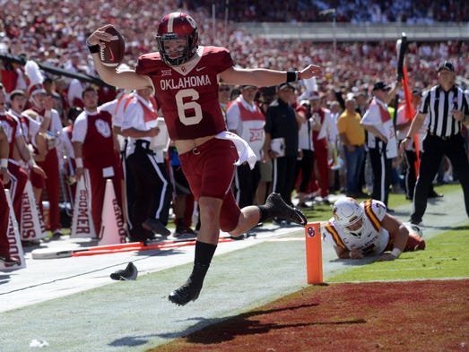Oklahoma Sooners quarterback Baker Mayfield (6) scores