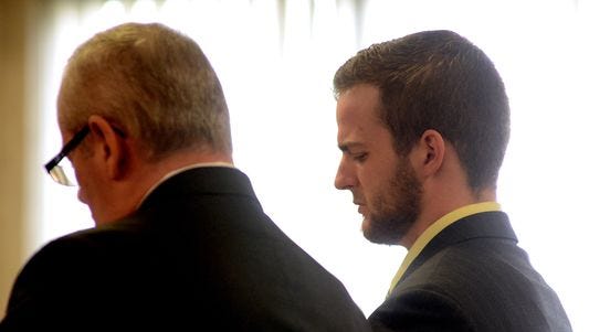 Charles Kelly listens to the victim’s father address the courtroom Monday, May 4, 2015, during his sentencing.
