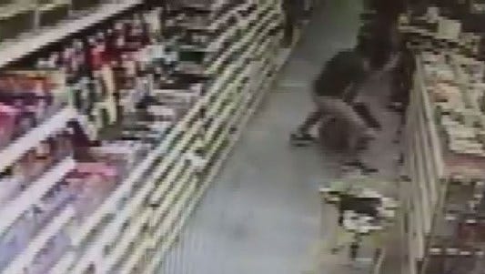 Surveillance video shows a mother fighting off a man who Florida deputies say was trying to kidnap her daughter.