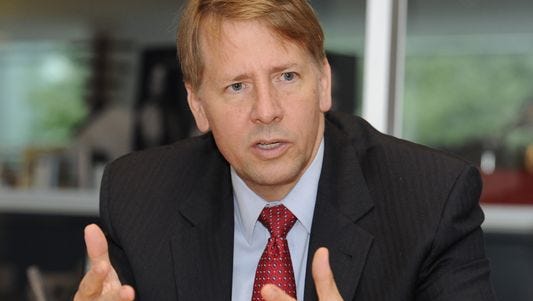 Richard Cordray, head of the Financial Consumer Protection Bureau, speaking in 2013.