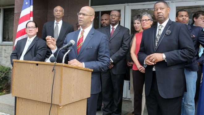 Derickson Lawrence, chairman of the Westchester County Homeowners Coalition, speaks during a school rally last year.