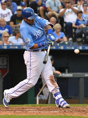 Royals catcher Salvador Perez (13) hits a solo home run in the seventh inning against the Seattle Mariners on Saturday.