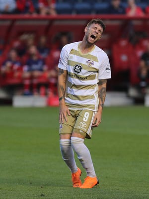 Louisville City FC's Cameron Lancaster is upset his shot on goal missed. LouCity was playing the Chicago Fire in the U.S. Open Cup.July 18, 2018