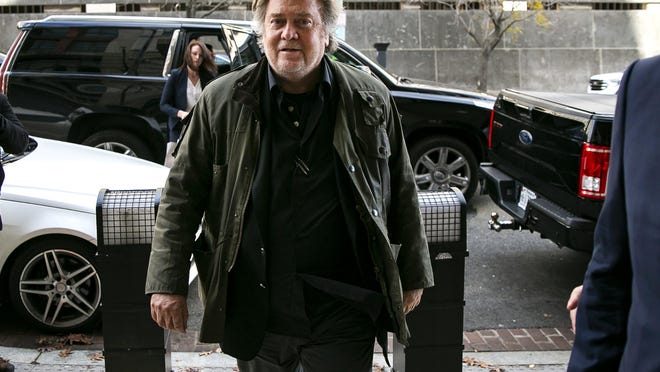 FILE - In this Nov. 8, 2019 file photo, former White House strategist Steve Bannon arrives to testify at the trial of Roger Stone, at federal court in Washington. Bannon was arrested Thursday, Aug. 20, 2020, on charges that he and three others ripped off donors to an online fundraising scheme â€œWe Build The Wall.â€ The charges were contained in an indictment unsealed in Manhattan federal court.