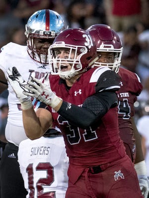 Aggies linebacker Dalton Herrington and the New Mexico State seniors look for their first victory over UTEP when they host the Miners on Saturday.

Gary Mook/ for the Sun-News