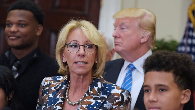 US Education Secretary Betsy DeVos speaks at a school choice event watched by US President Donald Trump in the Roosevelt Room of the White House on May 3, 2017 in Washington, DC.