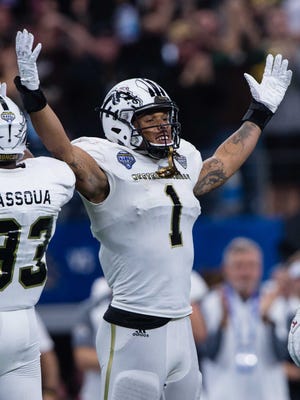 Western Michigan Broncos defensive end Keion Adams (1) celebrates during the game against the Wisconsin Badgers in the 2017 Cotton Bowl game at AT&T Stadium on Jan. 2, 2017. The Badgers defeated the Broncos 24-16.