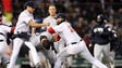 Mitch Moreland, right of the Red Sox, works to separate
