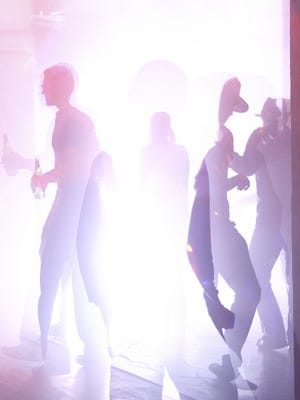 Nightclub scene with people on the dance floor