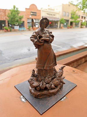 Scott Rogers' sculpture, “All Her Chicks,” is on display near Main Street Plaza as part of Art Around the Corner's outdoor exhibit in St.. George.