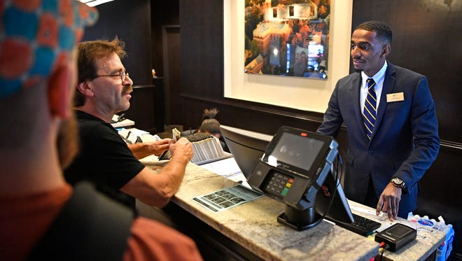 TSU student and Saudi Arabia native Suhayb Hawsawi works the front desk at the Homewood Suites by Hilton Nashville Vanderbilt hotel. TSU added a hospitality management concentration in recent yearsFriday Sept. 29, 2017, in Nashville, TN