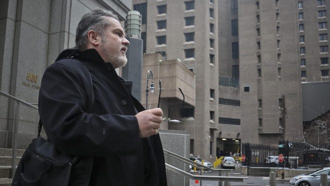 Jack Donson, president of New York-based My Federal Prison Consultant and a retired federal Bureau of Prisons employee, outside federal court and Manhattan Correctional Center, right, where he's consulted with inmate clients, Friday March 1, 2019, in New York.