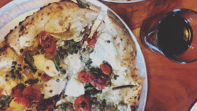 Lupo recently opened on Frankfort Ave.. The Italian menu will rotate seasonally but customers can expect toppings, like eggplant, to grace their pies right now.