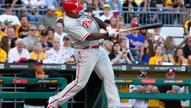 The Phillies’ Marlon Byrd grounds into a double play, scoring a run in the sixth inning Friday.