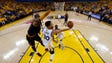Stephen Curry shoots past LeBron James during Game