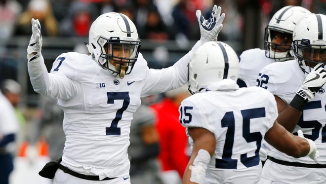 Penn State linebacker Koa Farmer celebrates recovering a fumble against Ohio State during the first half of an NCAA college football game Saturday, Oct. 28, 2017, in Columbus, Ohio. (AP Photo/Jay LaPrete)