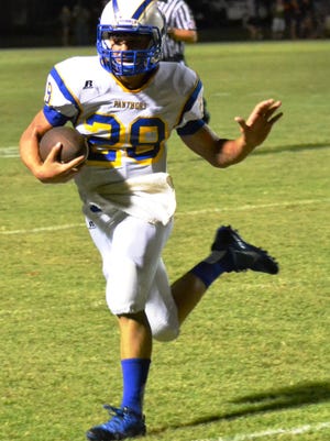 Buckeye quarterback Trent Smith (28) runs against Menard earlier this season. Smith has rushed for nearly 1,000 yards on the season for the Panthers, who will host Avoyelles Friday night.