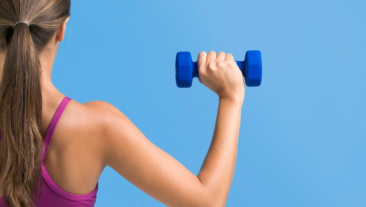 Woman lifting a weight