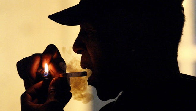 Man smoking medical marijuana in Portland.