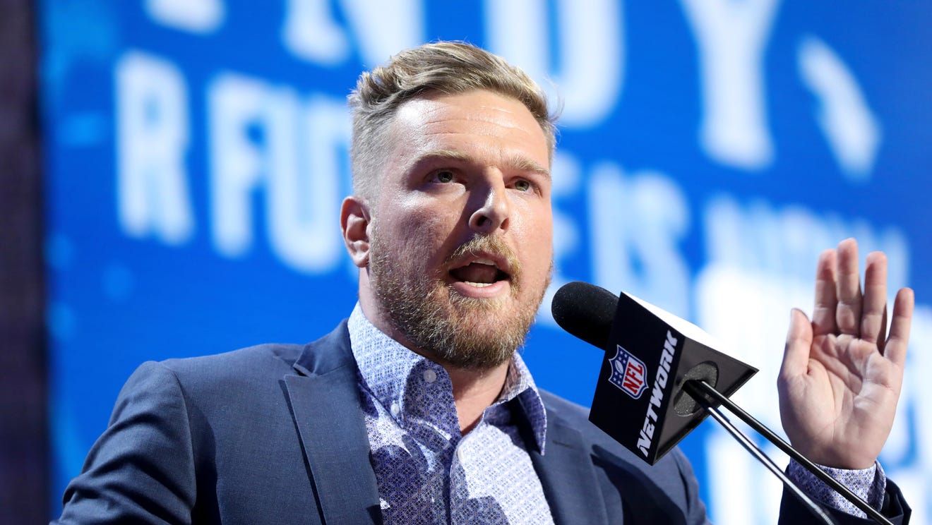 Former Indianapolis Colts player Pat McAfee announces the Colts' third round pick at the NFL football draft, in Nashville, Tenn. on Friday, April 26, 2019. (AP Photo/Gregory Payan)